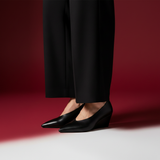 1:1 - Black wedge pumps close-up