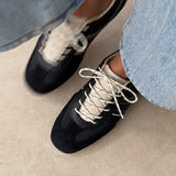 Contrast sneaker shown from the side