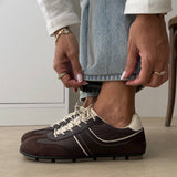 Pair of sneakers shown from above
