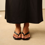 Eclipse Thong Mule - Black, side view on model