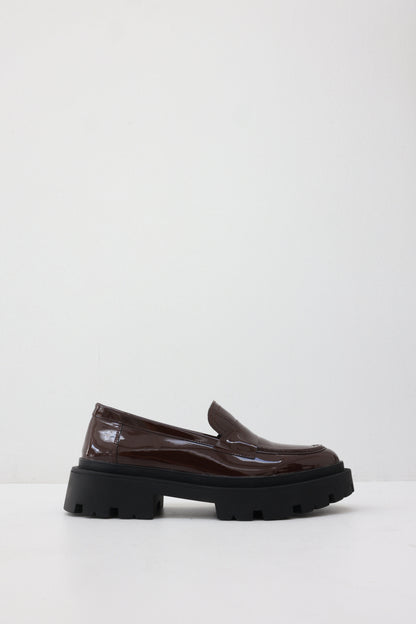 PATENT LEATHER LOAFERS WITH THICK SERRATED SOLE AND BAND DETAILED