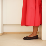 Brown flat - lifestyle with red dress
