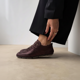 Brown sneaker - hand on ankle 1:1
